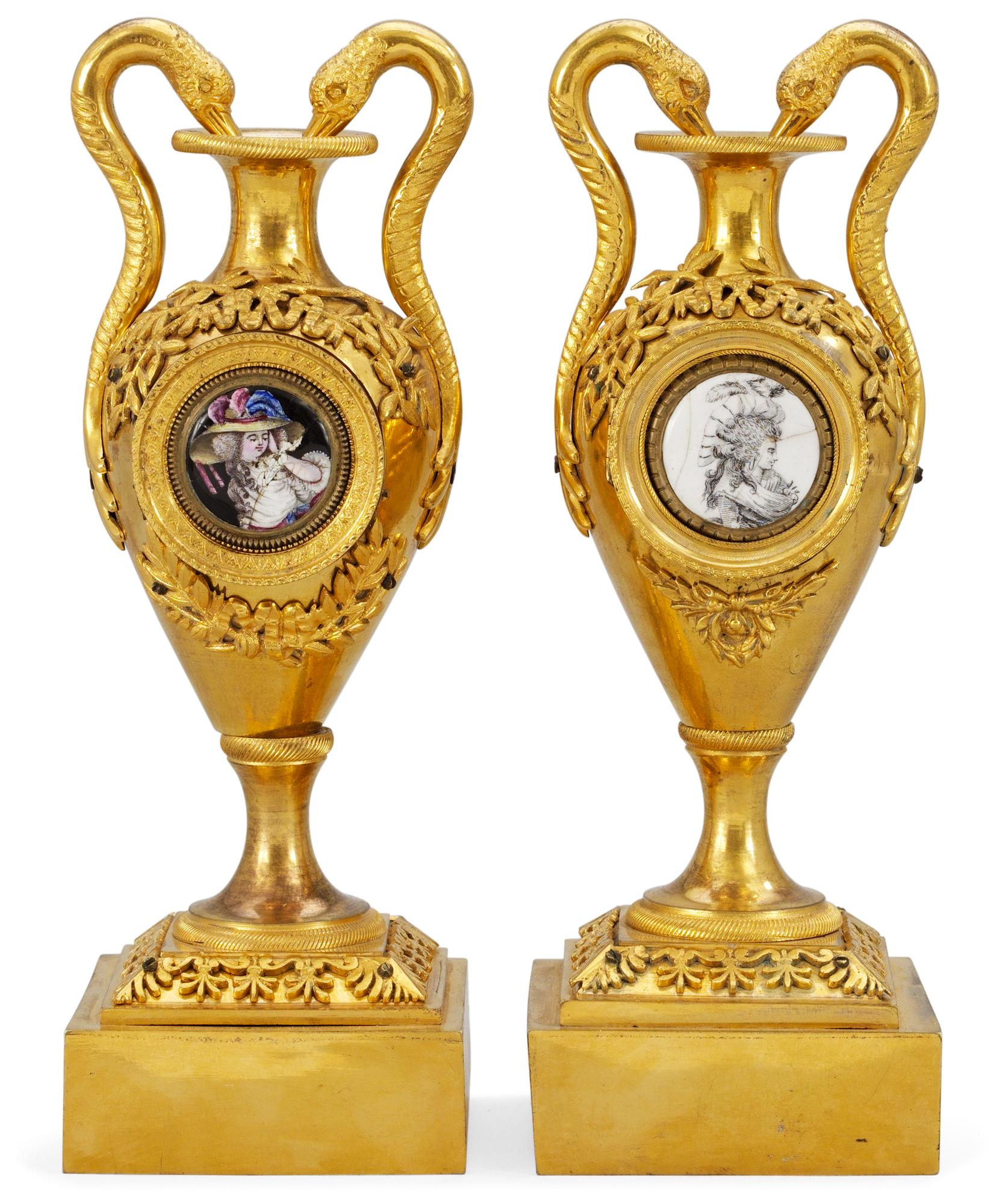 Two matched 19th century table urns.