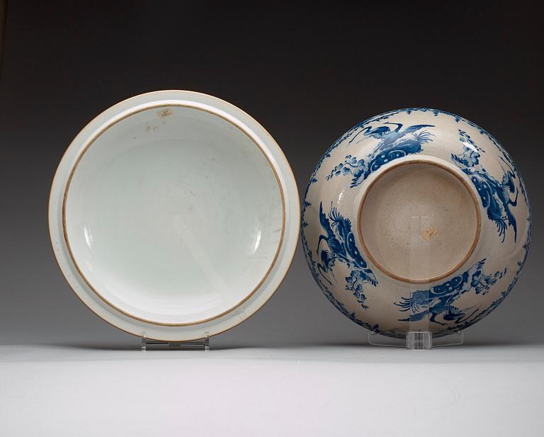A massiv blue and white armorial punch bowl with cover with the arms of the Grill family, Qingdynasty, 18th Century.