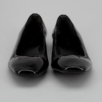 SKOR, ballerinas, Prada.