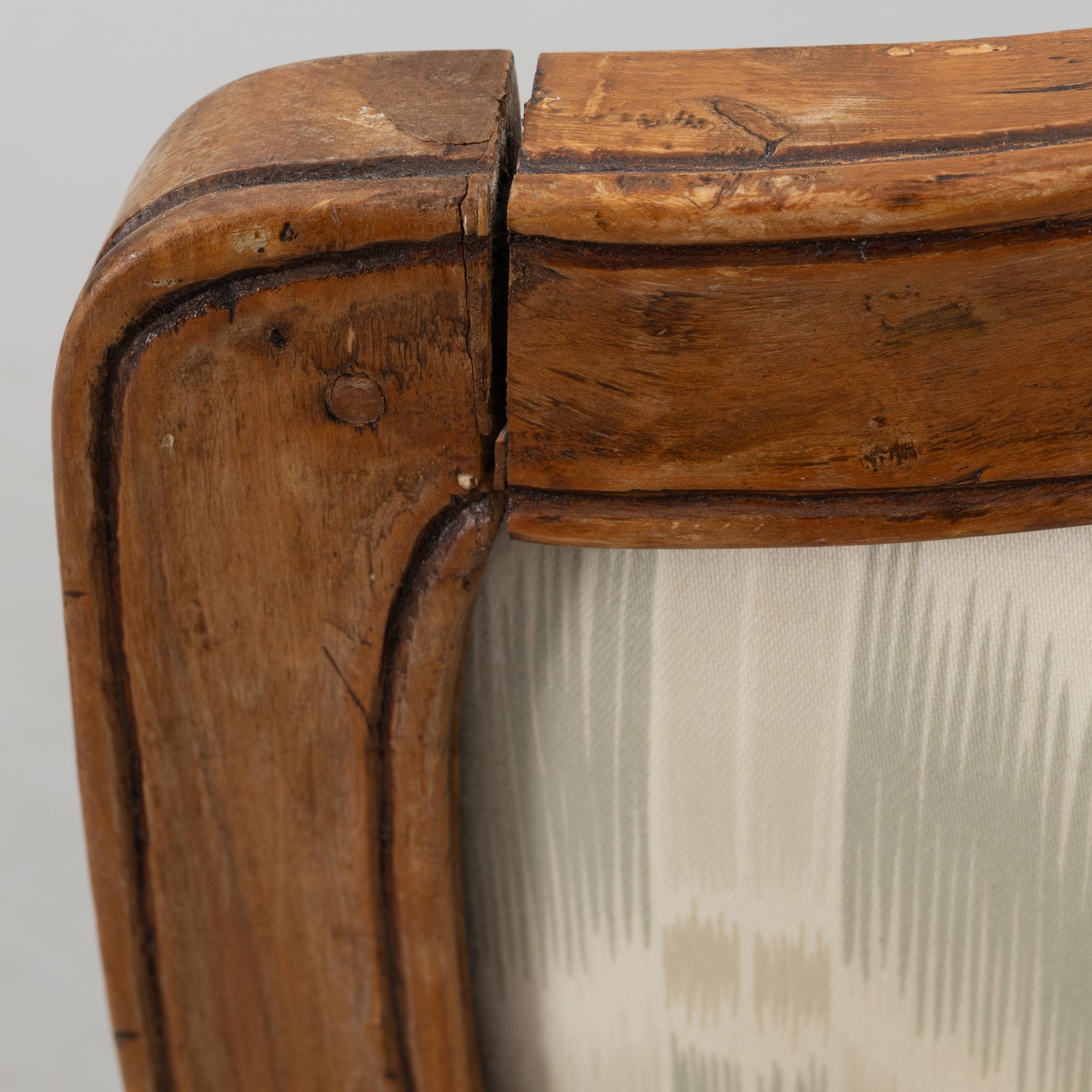 A pair of French Louis XV fauteuils, mid 18th century.