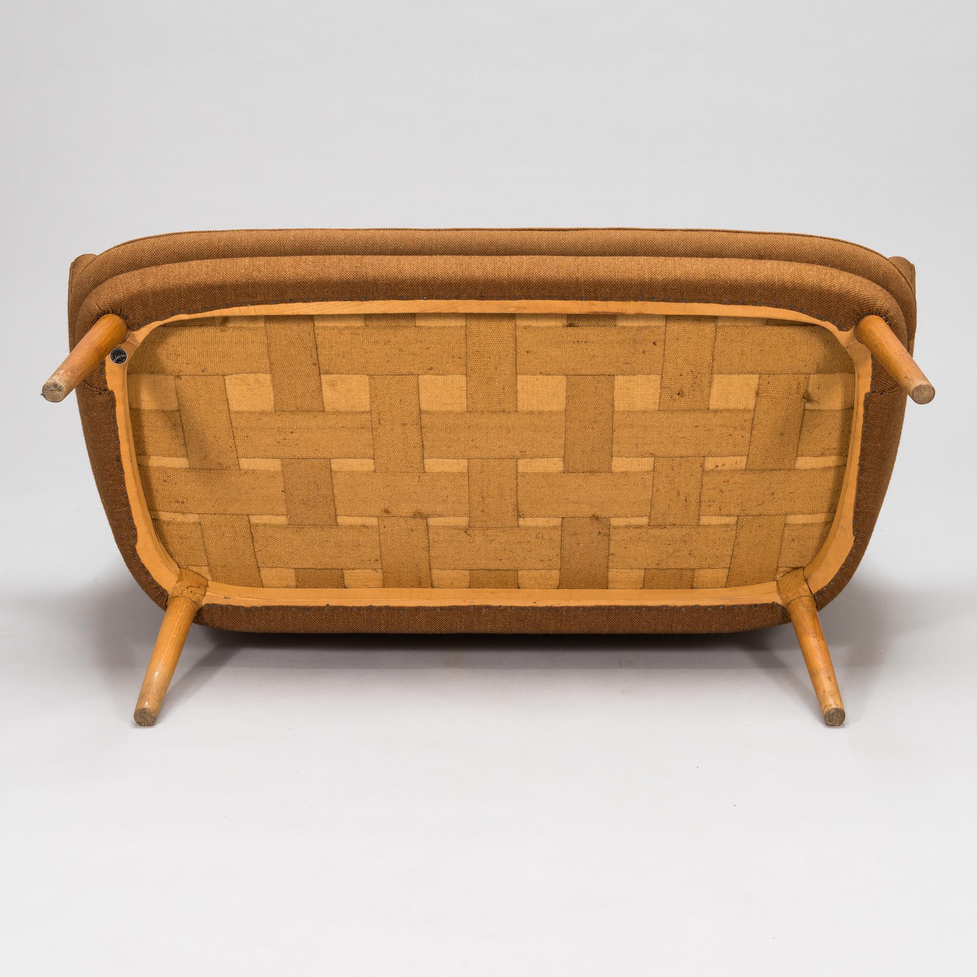 Hans J Wegner, a 1950's sofa for  för AP-Stolen Denmark.