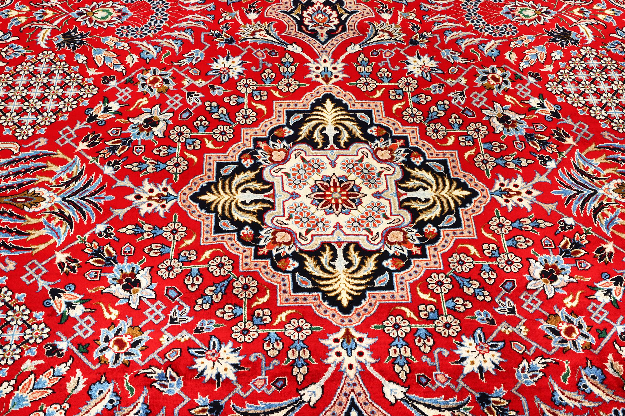 A Kashan carpet, c. 350 x 224 cm.