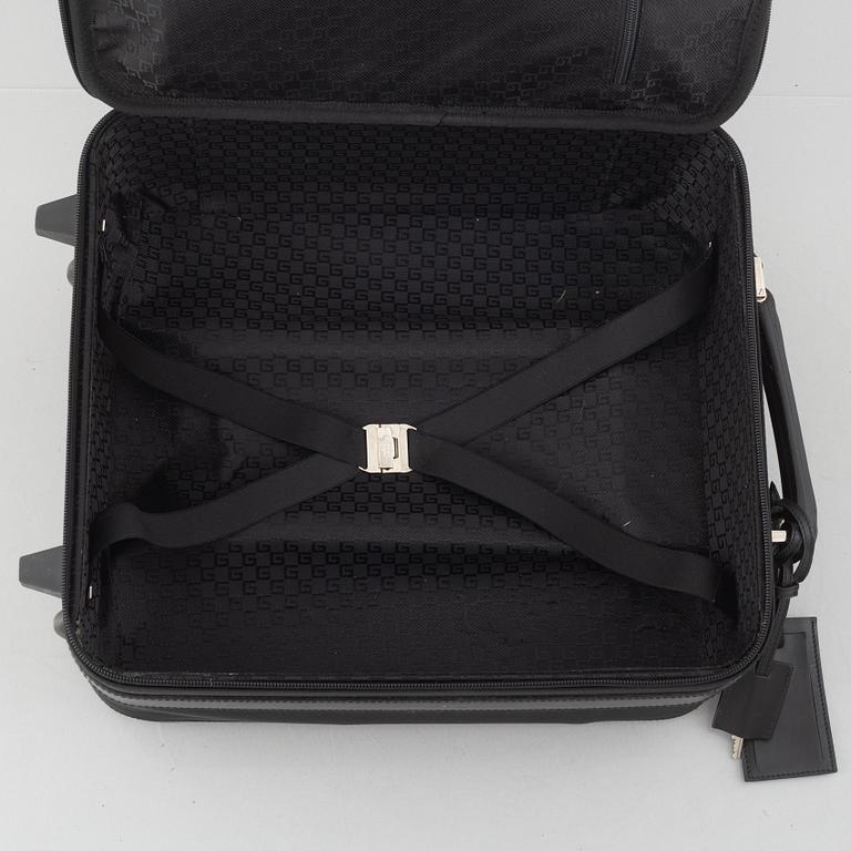 Gucci, suitcase/cabin bag.