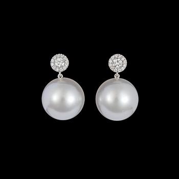 A pair of cultured South sea pearl, 14 mm, and brilliant dut diamond earrings, tot. 0.42 cts.