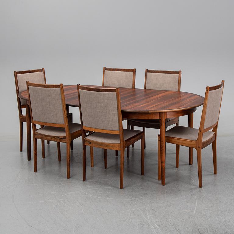 A seven-piece rosewood dining suite, 1960's/70's.