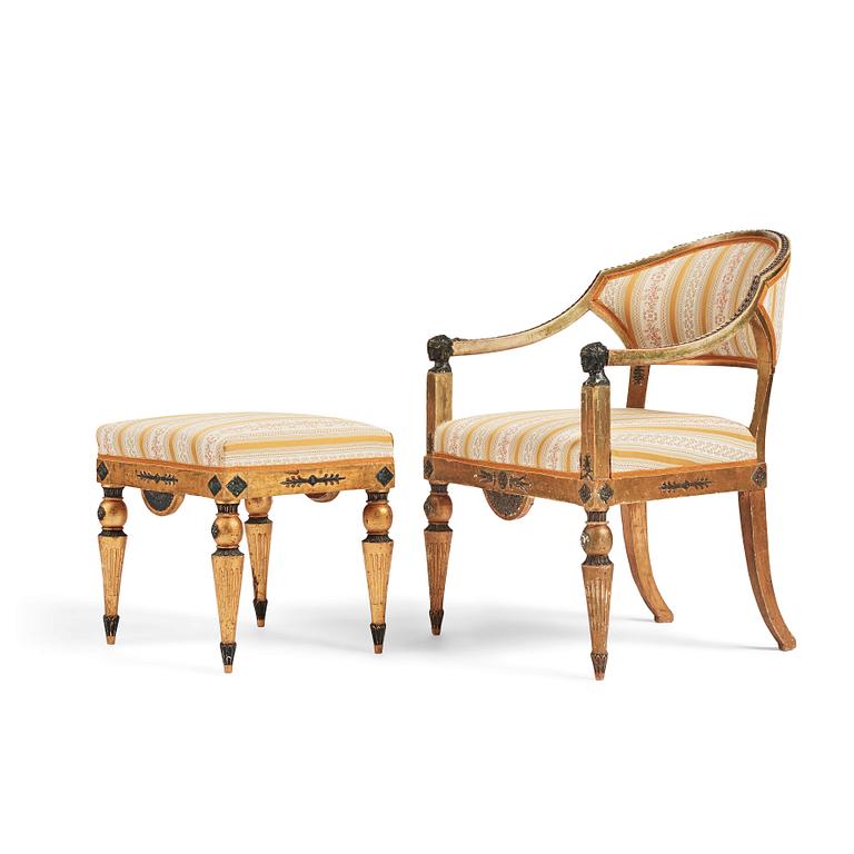 A Late gustavian armchair and stool in the manner of C G Gjörwll (1766-1837).