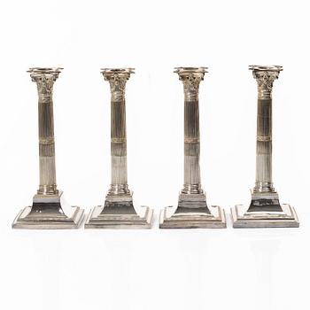 Four silver plated candlesticks, early 20th century.