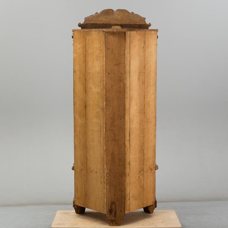 KNUT FJAESTAD, a folk art oak cabinet, signed KF 1935.