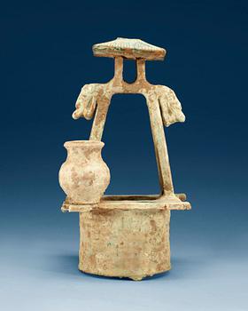 1602. A green glazed pottery model of a well, Han dynasty (206B.C-220).