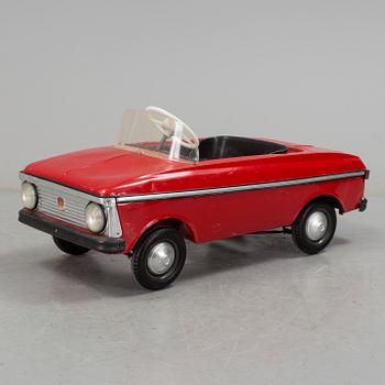 A pedal car from the 1970's.