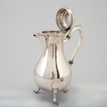 A three-piece silver coffee service from Borel & Co, Germany, mid 20th Century.
