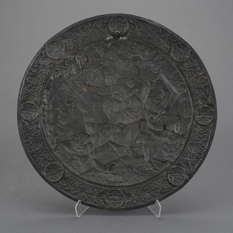 SKÖLD, bronserat gjutjärn, Bolinders, omkring sekelskiftet 1800/1900-tal. Märkt a tergo.