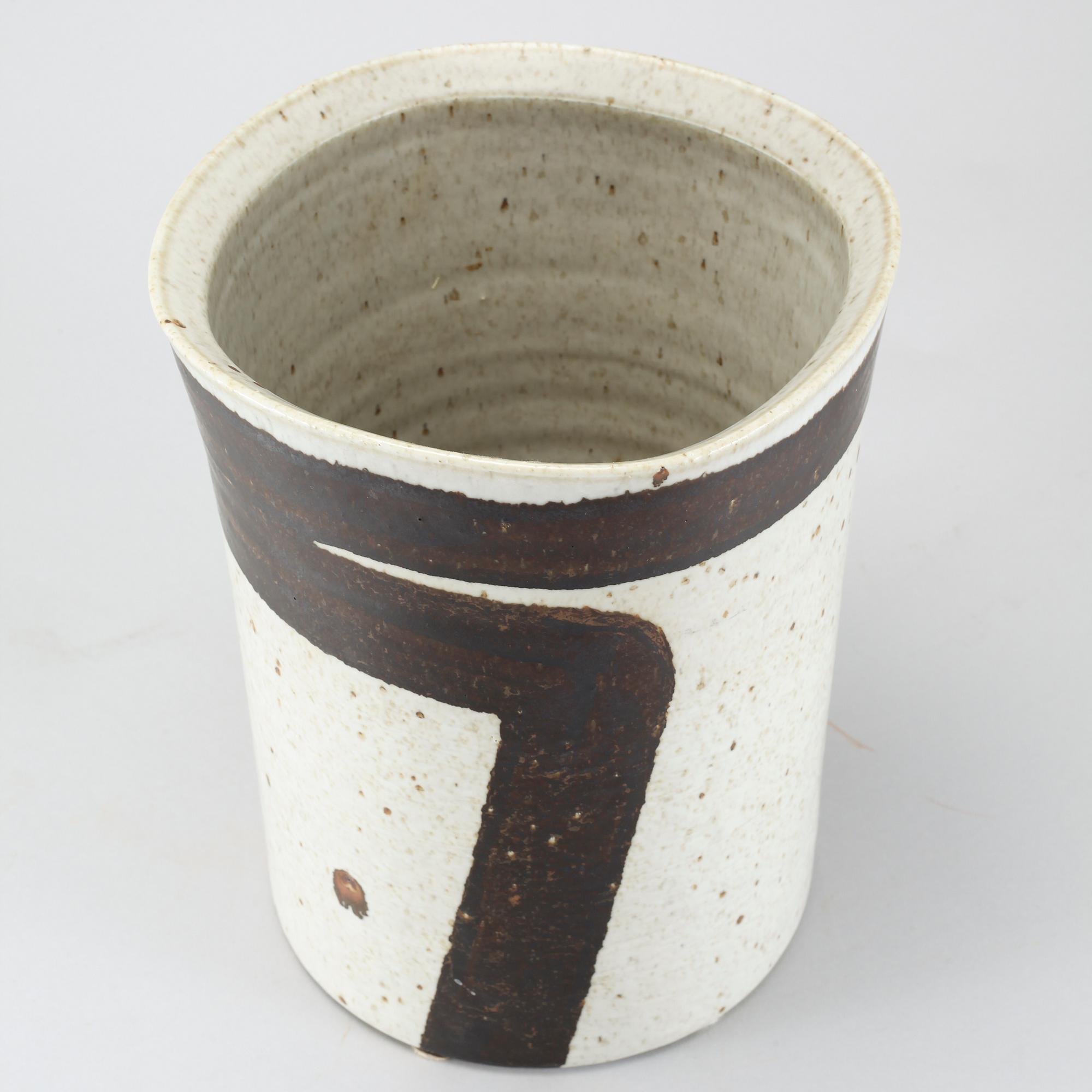 A stoneware flower pot by Inger Persson for Rörstrand Ateljé.