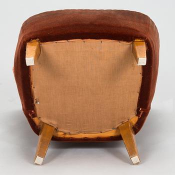 A mid-20th century armchair.