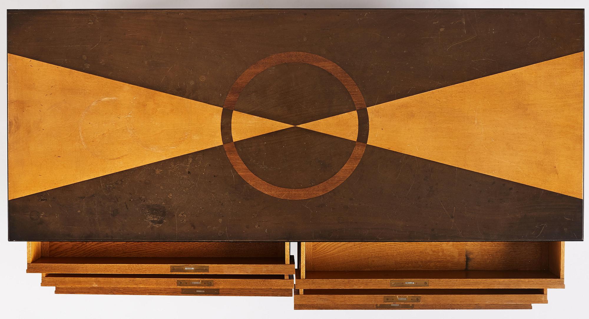Carl Bergsten, an oak veneered sideboard/ chest of drawers, Nordiska Kompaniet Sweden 1923. Part of a set exhibited in Gothenburg 1923.