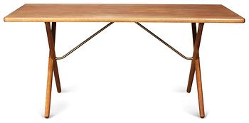 A Hans J Wegner teak and oak dinner table, Andreas Tuck, Denmark 1950-60's.