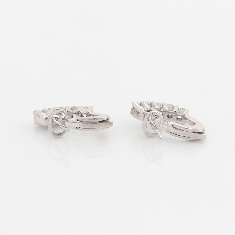Brilliant-cut diamond earrings.