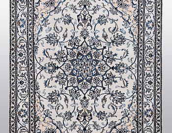 A rug, Nain, part silk, so called 9 LAA, ca 233 x 164 cm.