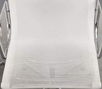 A pair of 'EA 108' desk chairs by Charles & Ray Eames for Vitra.