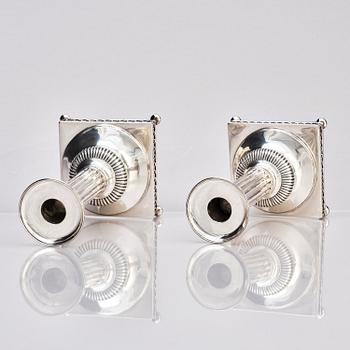 A pair of Swedish 18th century Gustavian silver candlesticks, marks of Arvid Floberg, Stockholm 1799.