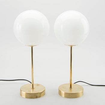 A pair of modern table lamps.