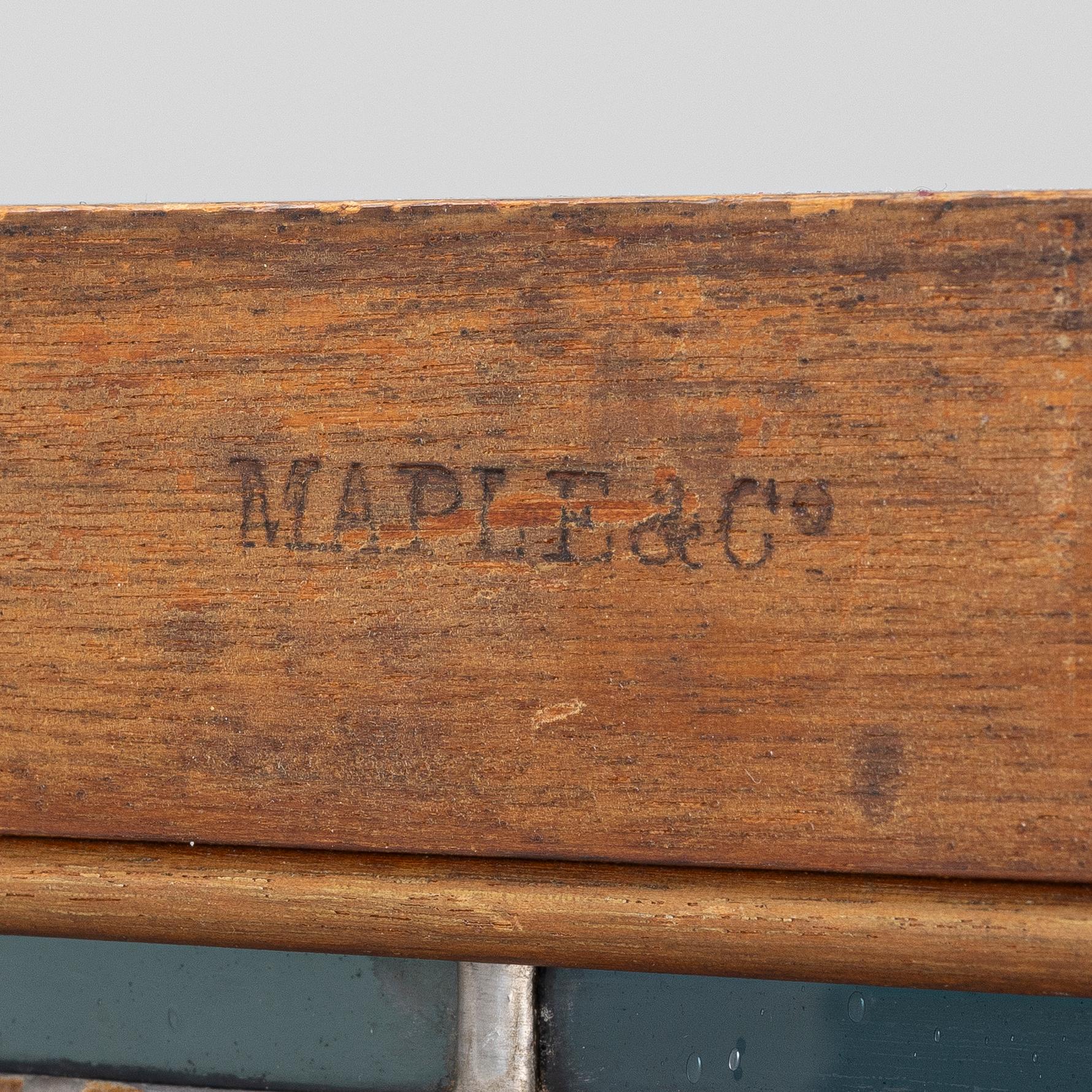 A fire screen, Maple & Co, England, circa 1900.