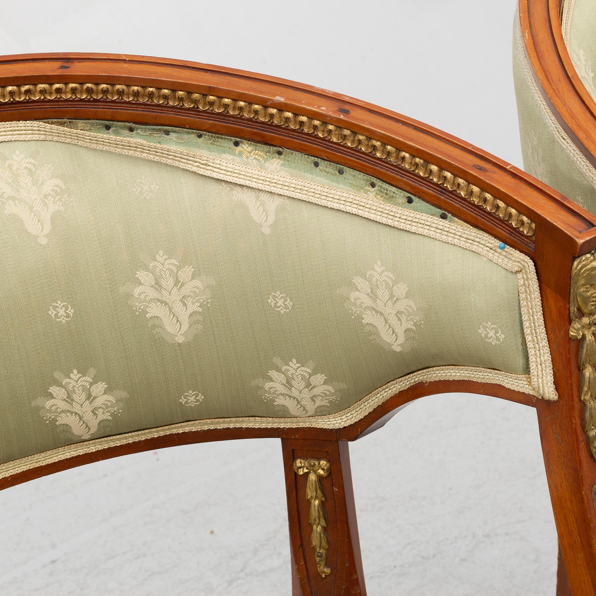 A pair of chairs, first half of the 20th century. Empire style.