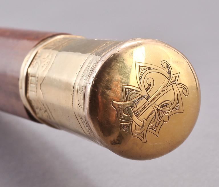 KÄPP med 18 k guldknopp, trä, 1800-talets första hälft.