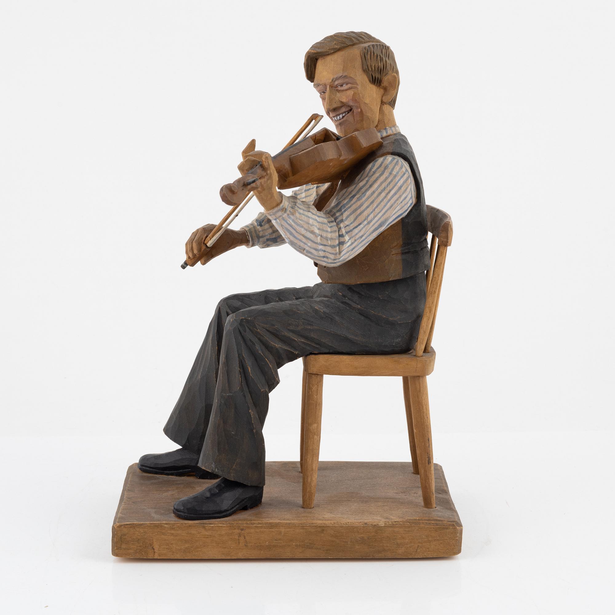 Herman Rosell, skulptur, snidat och bemålat trä, signerad HR och daterad 1945.