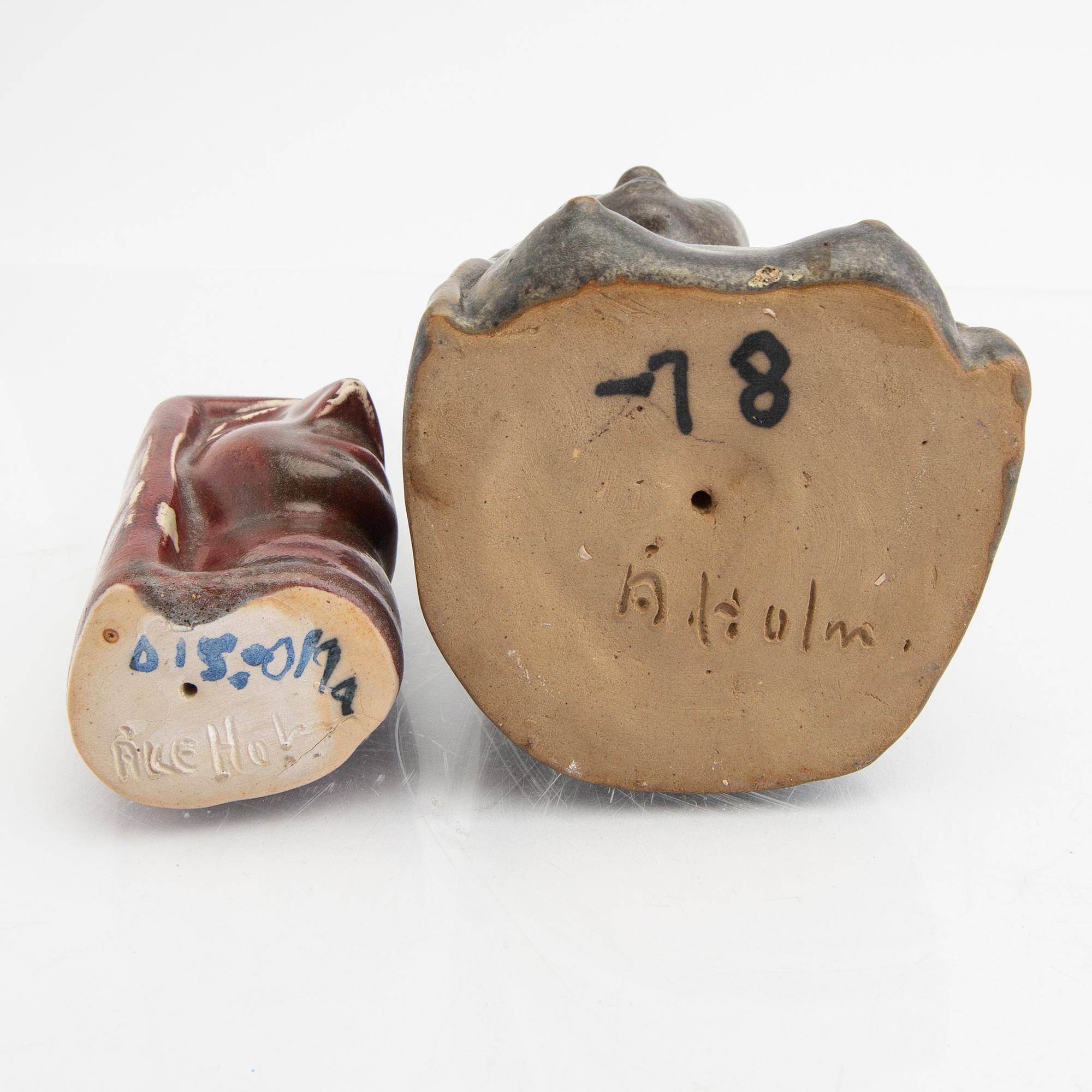 Åke Holm, a set of three signed figurines and a wall plaque.