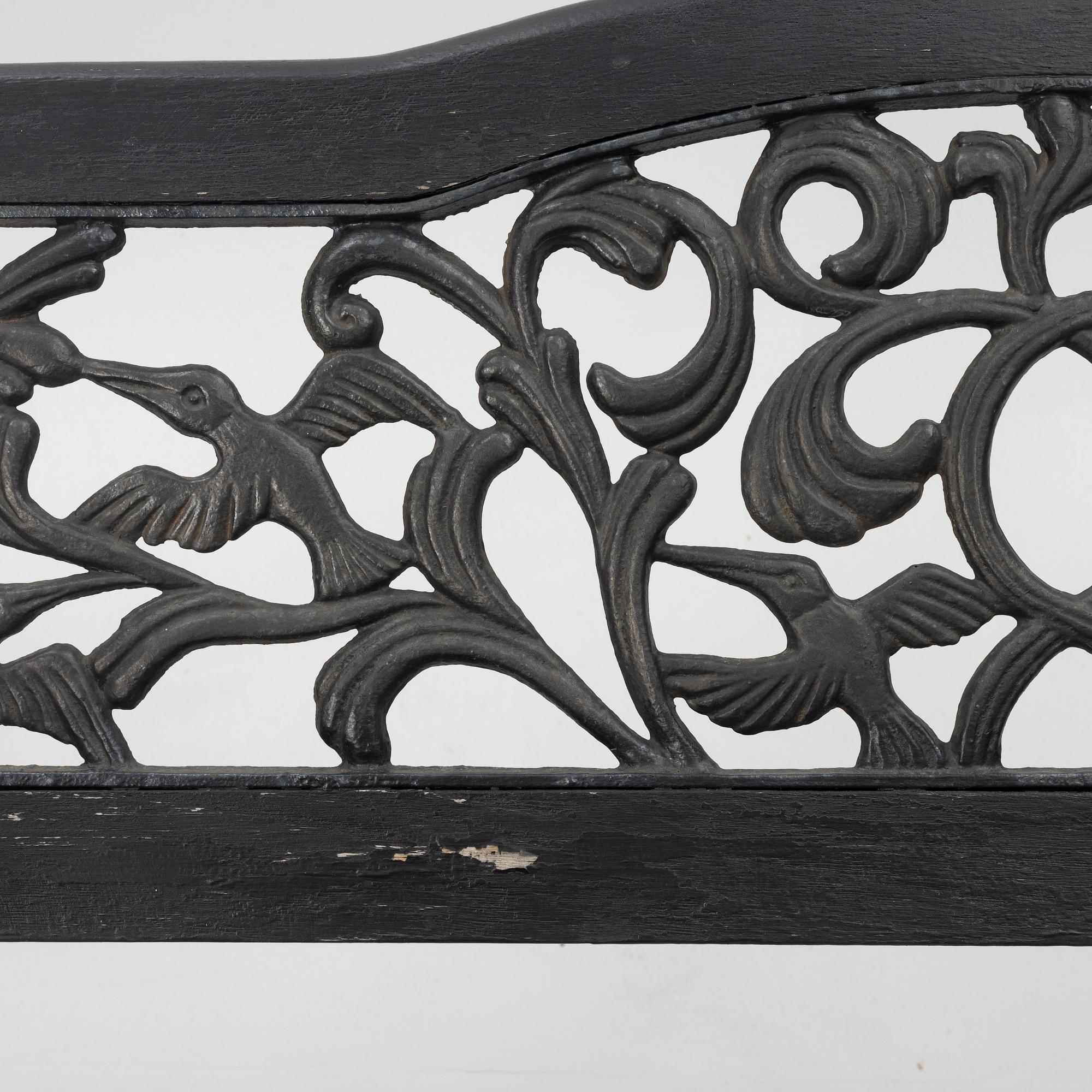 A garden bench, late 20th century.