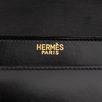 Hermès, a vintage leather bag.