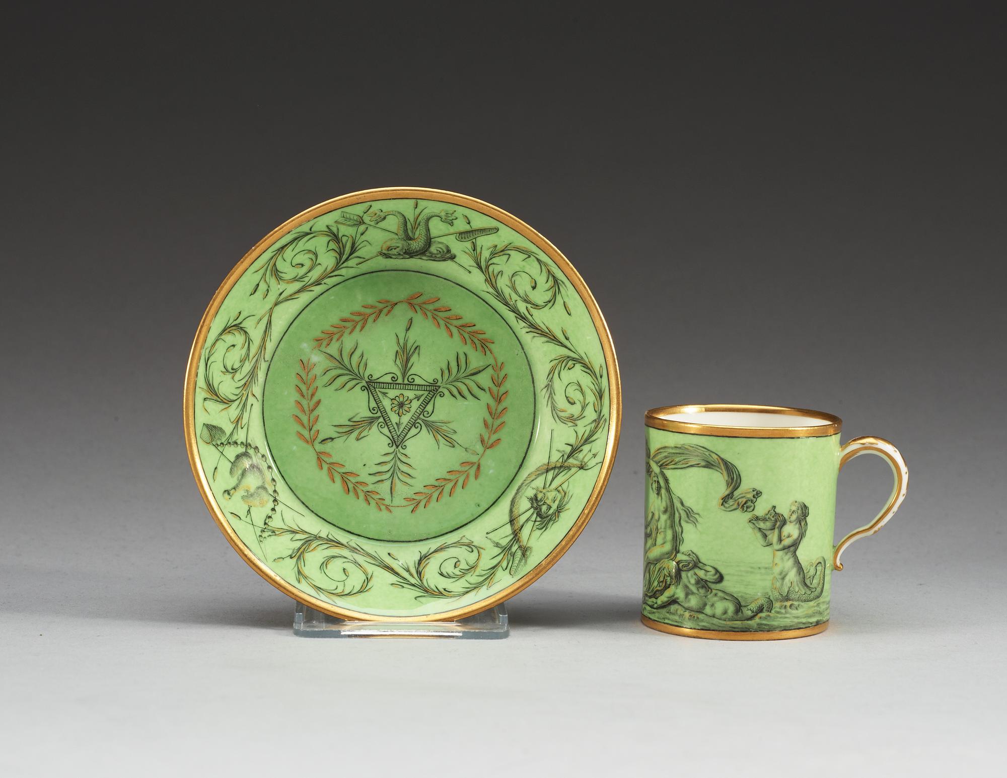 A green ground Sèvres cup and saucer, 18th Century.