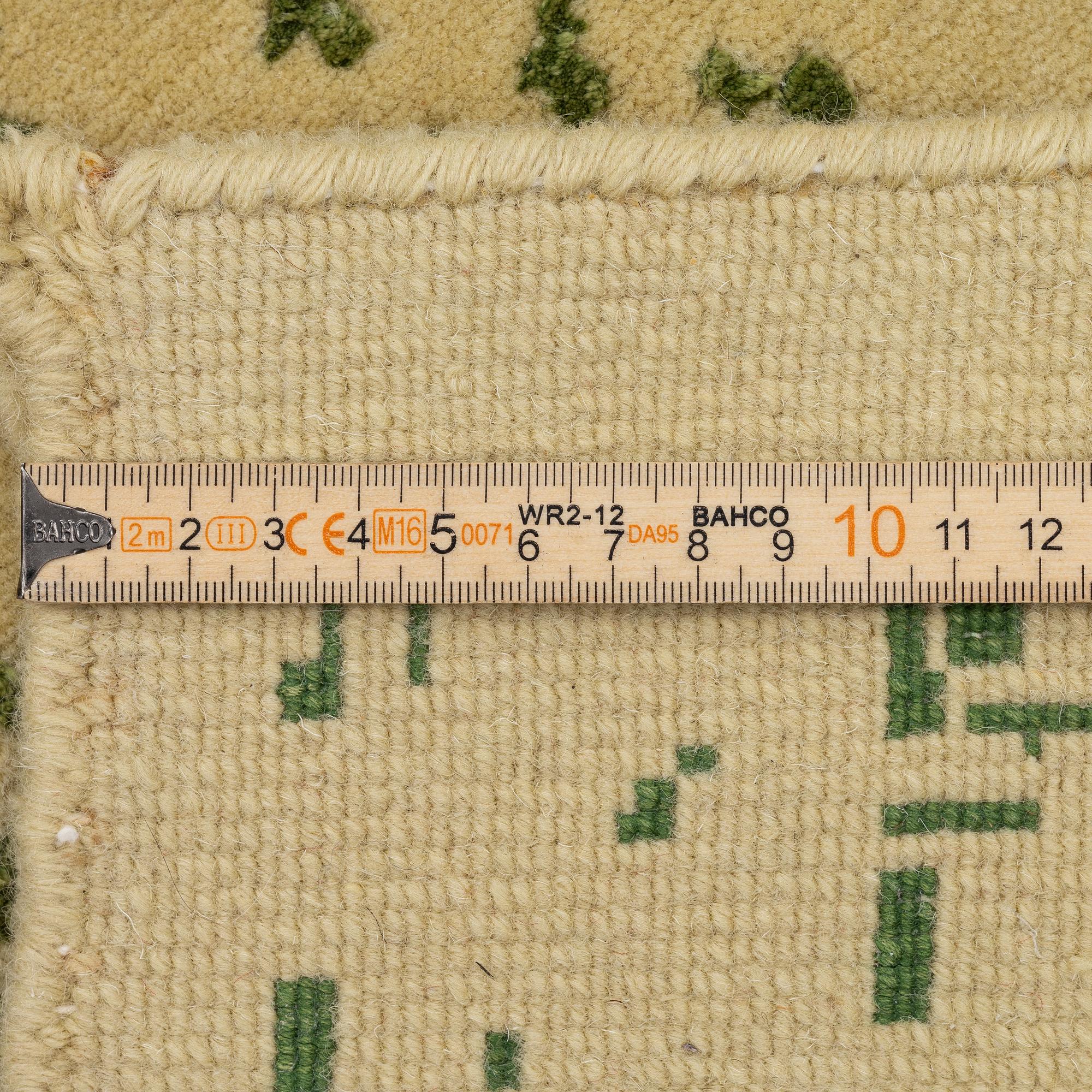 Rug, India, wool and silk with bamboo, approx. 230 x 173 cm.