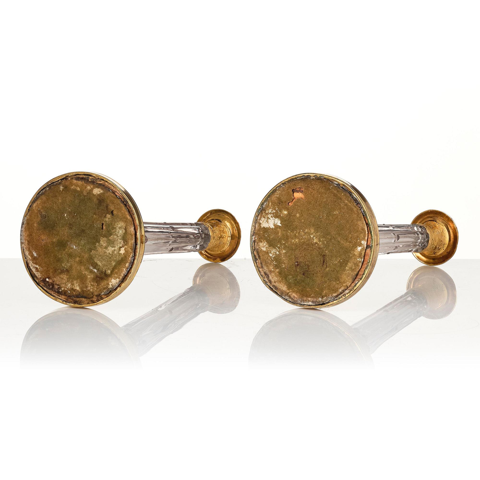 A pair of Russian ormolu and cut-glass Empire candlesticks, presumably St Petersburg, ca 1820.
