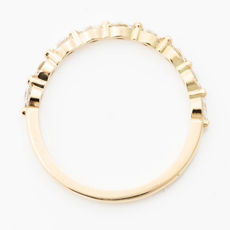 14K gold ring with marquise-cut diamonds.