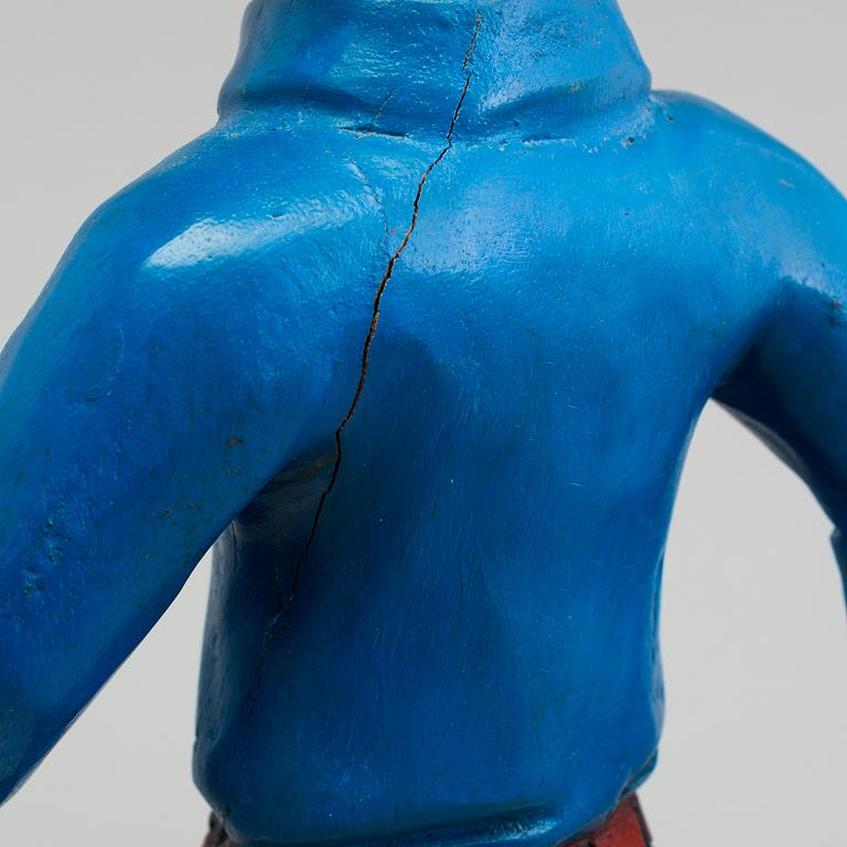 a Tintin and snowy wood scuplture from the second half of the 20th century.