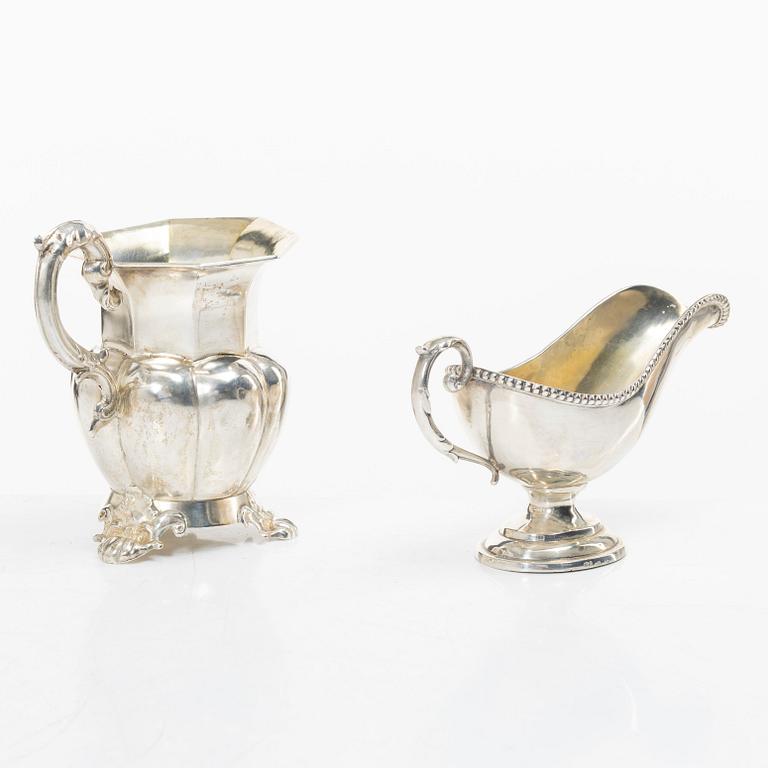 A silver gravy boat, Germany, and a silver creamer, johan Petter Tullgren, Sweden, 1857.