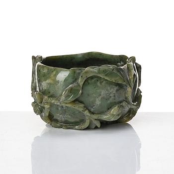 A peach shaped green stone brush washer, Qing dynasty.