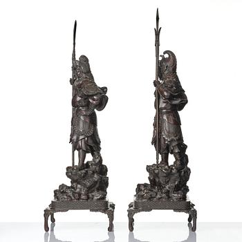 A pair of Japanese bronze guardians, Meiji period (1868-1912).