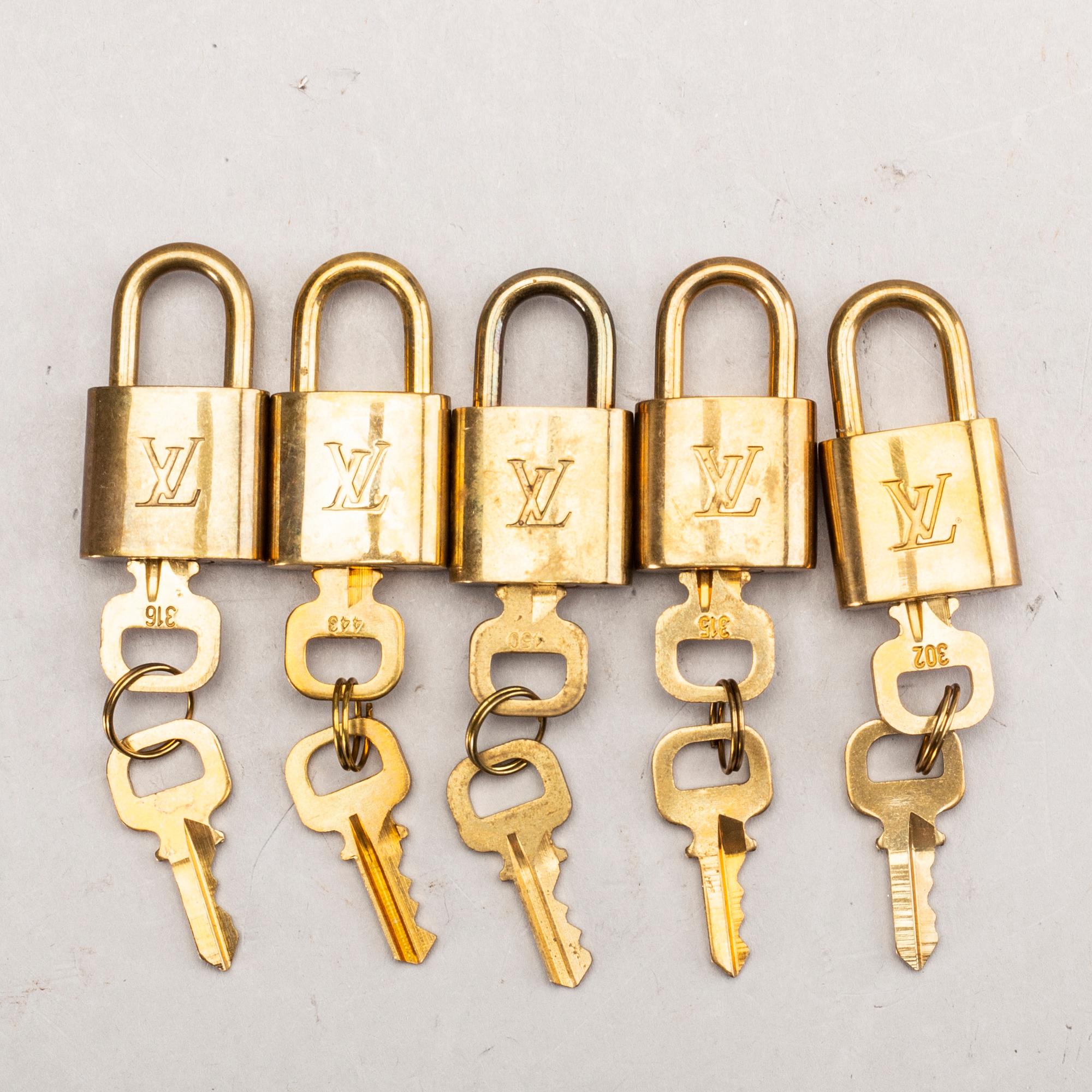 Louis Vuitton, Locks, 5 pcs.