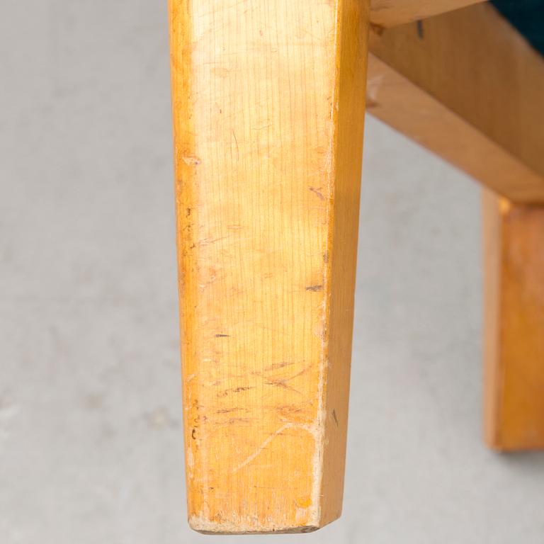 A pair of mid 20th century '2402 Armi' armchairs by Ilmari Lappalainen/Olavi Lieto, Asko, Finland.