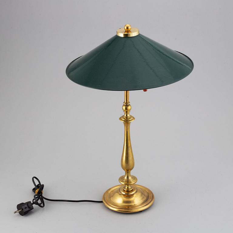 A brass table light, first half of the 20th Century.