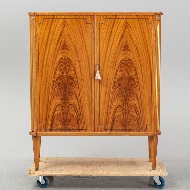 A mid 20th century mahogany veneered cabinet, Bodafors.