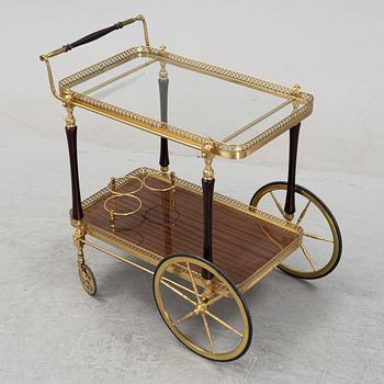 A brass and mahogany veneered drink's trolley, second half of the 20th Century.