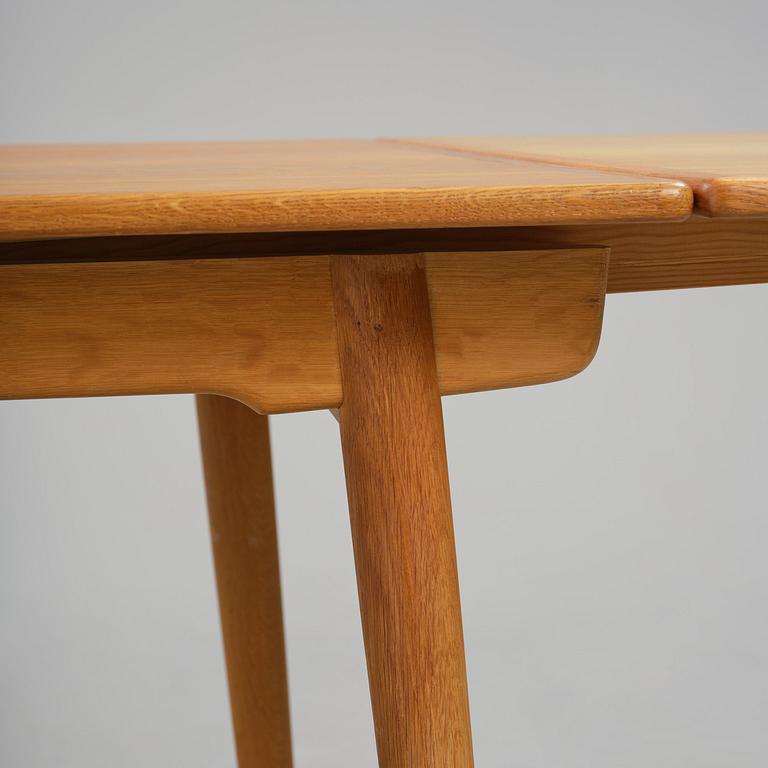 Hans J. Wegner, an "AT-312" dining table, Andreas Tuck, Denmark, 1950s-60s.