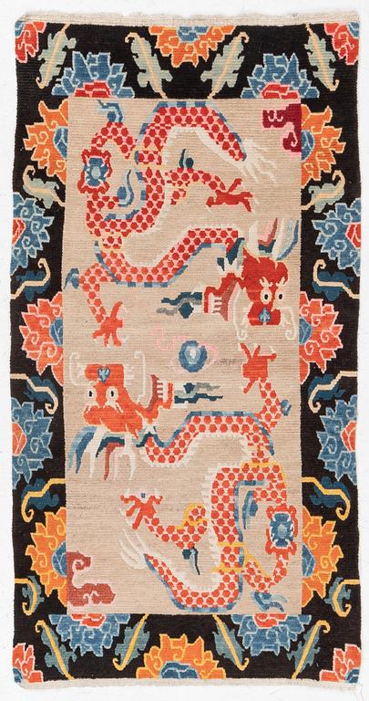 An antique rug, Tibet, circa 1900, approx. 157 x 83 cm.