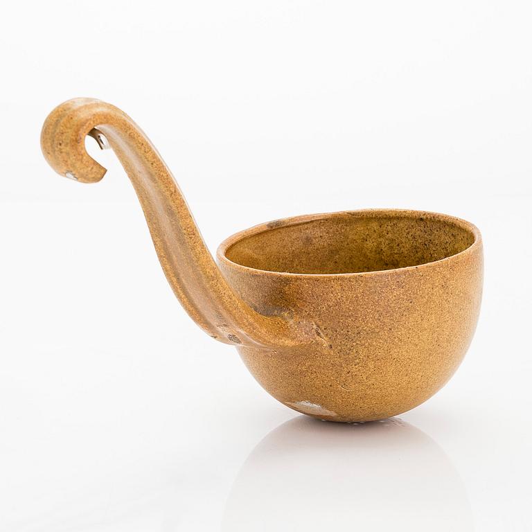 Kyllikki Salmenhaara, a stoneware stainer ladle, signed KS.