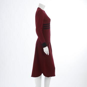 SONIA RYKIEL, a burgundy red sweater and skirt.