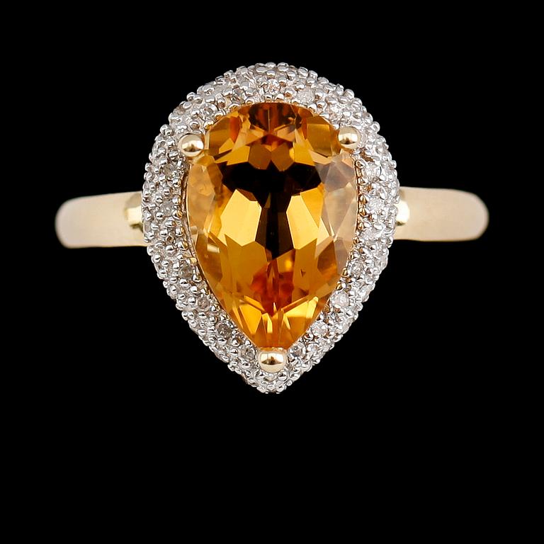 RING, 14 k guld, droppformad citrin, mindre diamanter tot ca 0.14 ct.